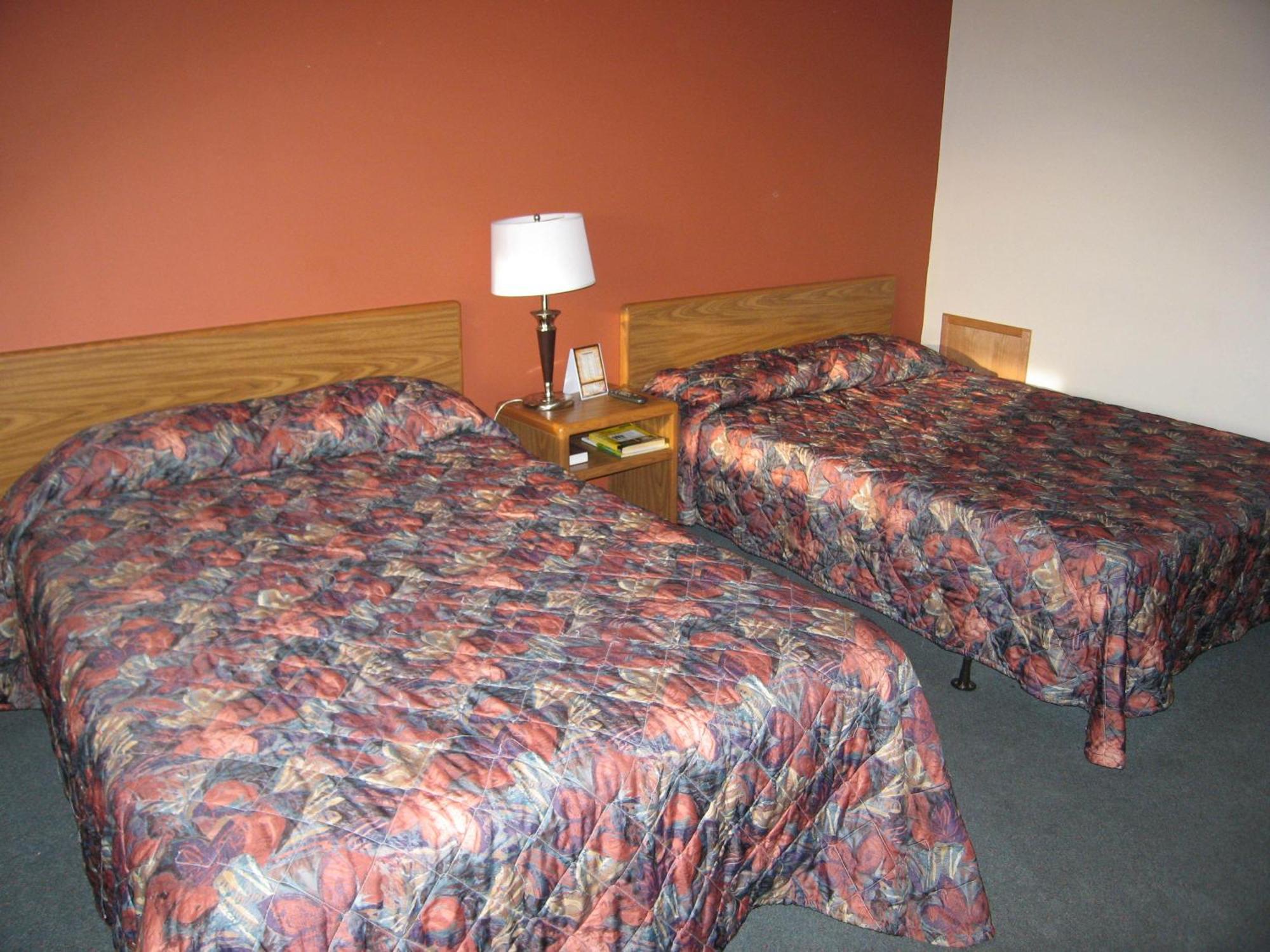 Travelers Lodge Marshall Rum bild